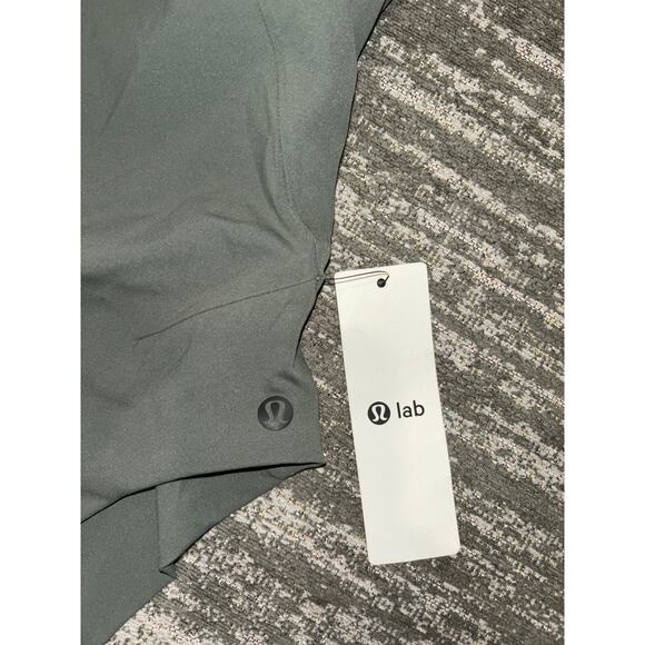 NWT Lululemon Aer Bodysuit *lululemon lab
Palm Deco Sz 2 - Picture 7 of 10
